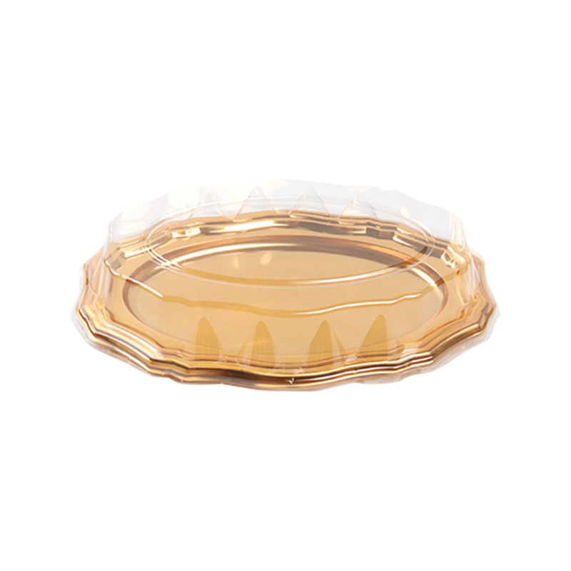 Gyllene tårtfat i plast
